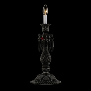Стильная хрустальная настольная лампа Baccarat с черным абажуром.